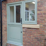sage green stable door and window