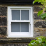 white wooden sash window